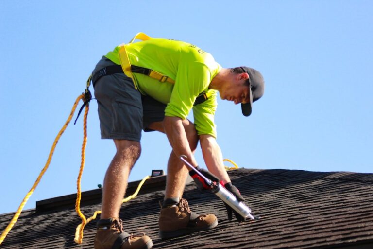 A homeowner examining asphalt shingles, metal panels, and clay tiles in a residential backyard.